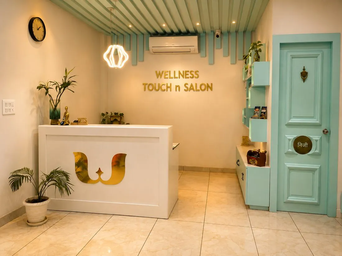 Reception desk with the Wellness Touch n Salon emblem